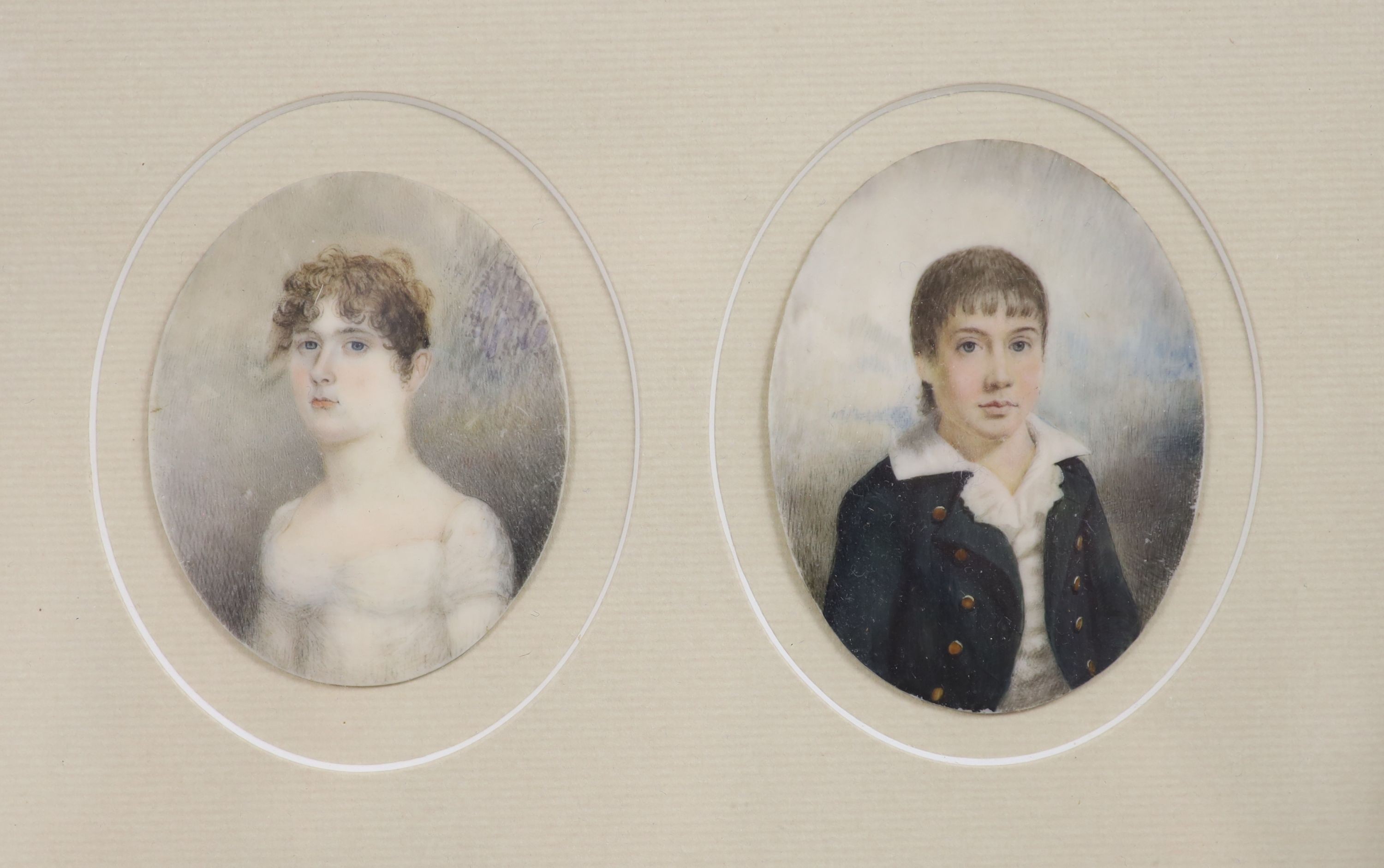 Early 19th century English School, pair of oil on ivory miniatures, Portraits of a youth and young woman, 7 x 5.5cm, framed as one